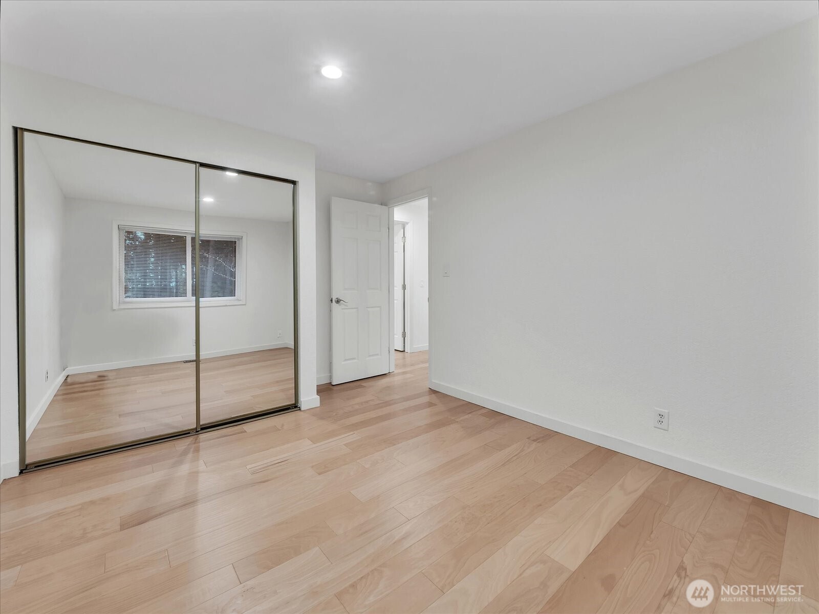 20921 28th Avenue Southeast Bothell, WA 98021 - Photo 19 of 37 an empty room with sliding glass door and shower