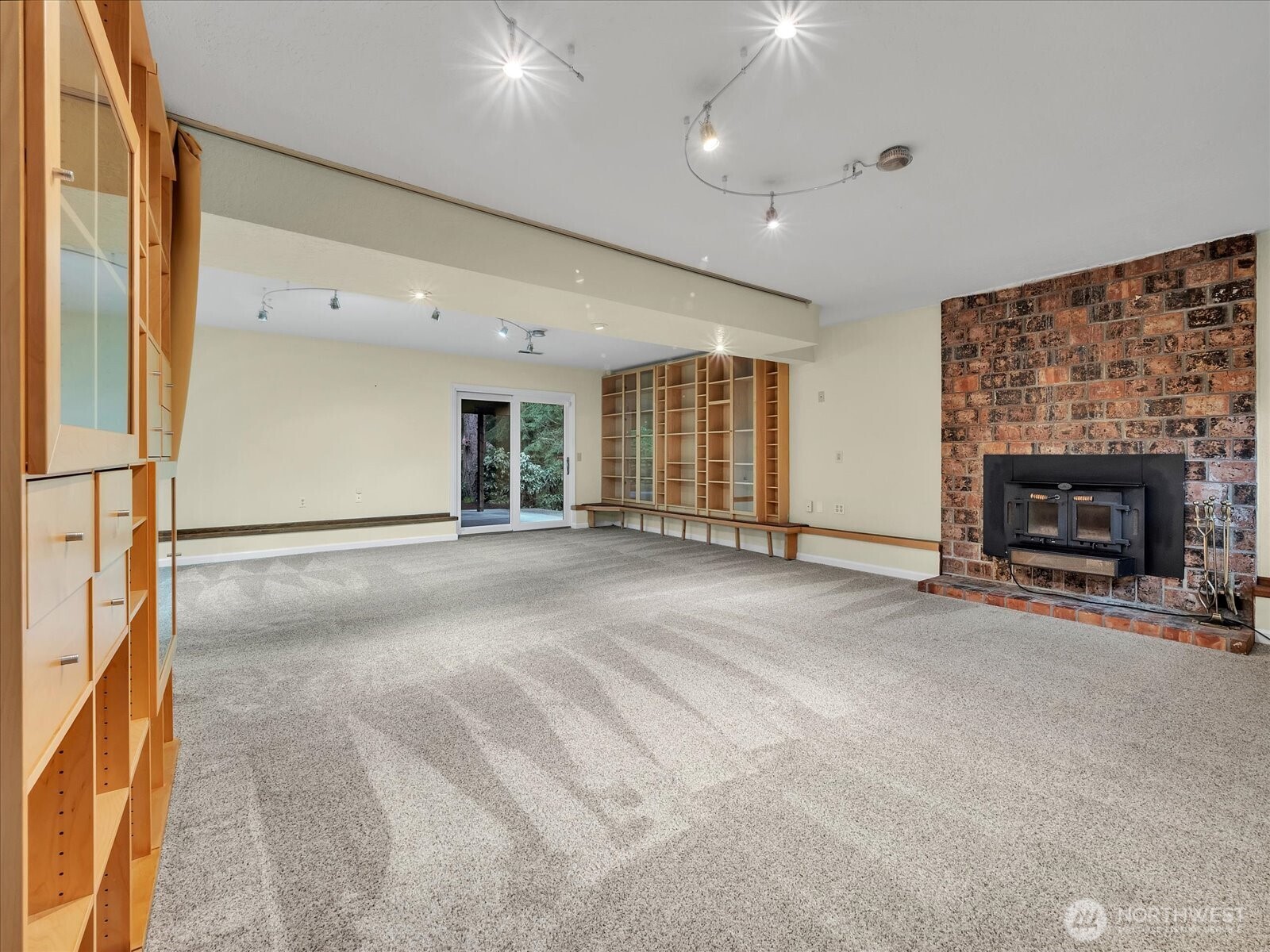 20921 28th Avenue Southeast Bothell, WA 98021 - Photo 25 of 37 a view of an empty room with a fireplace