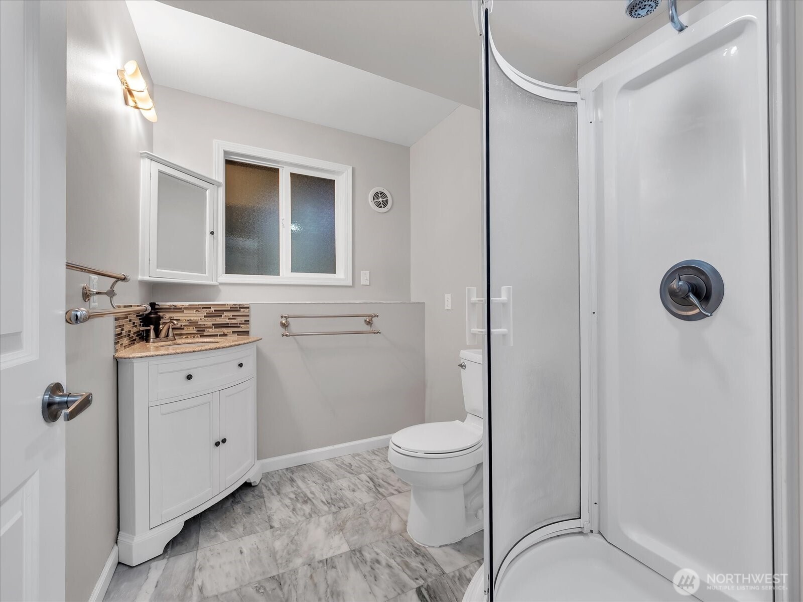 20921 28th Avenue Southeast Bothell, WA 98021 - Photo 28 of 37 a bathroom with a granite countertop sink toilet and shower
