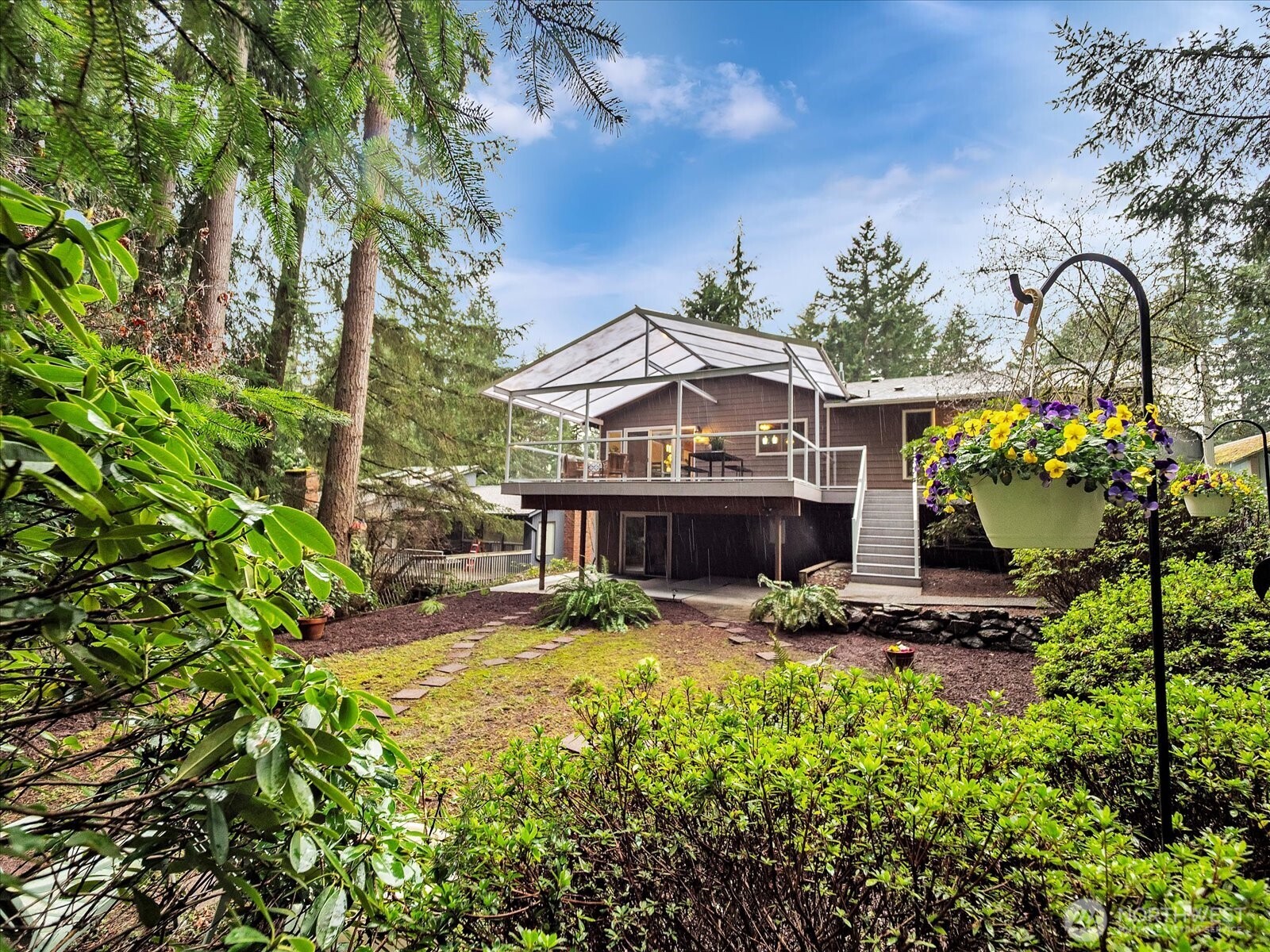 20921 28th Avenue Southeast Bothell, WA 98021 - Photo 30 of 37 a view of a house with a yard patio and swimming pool