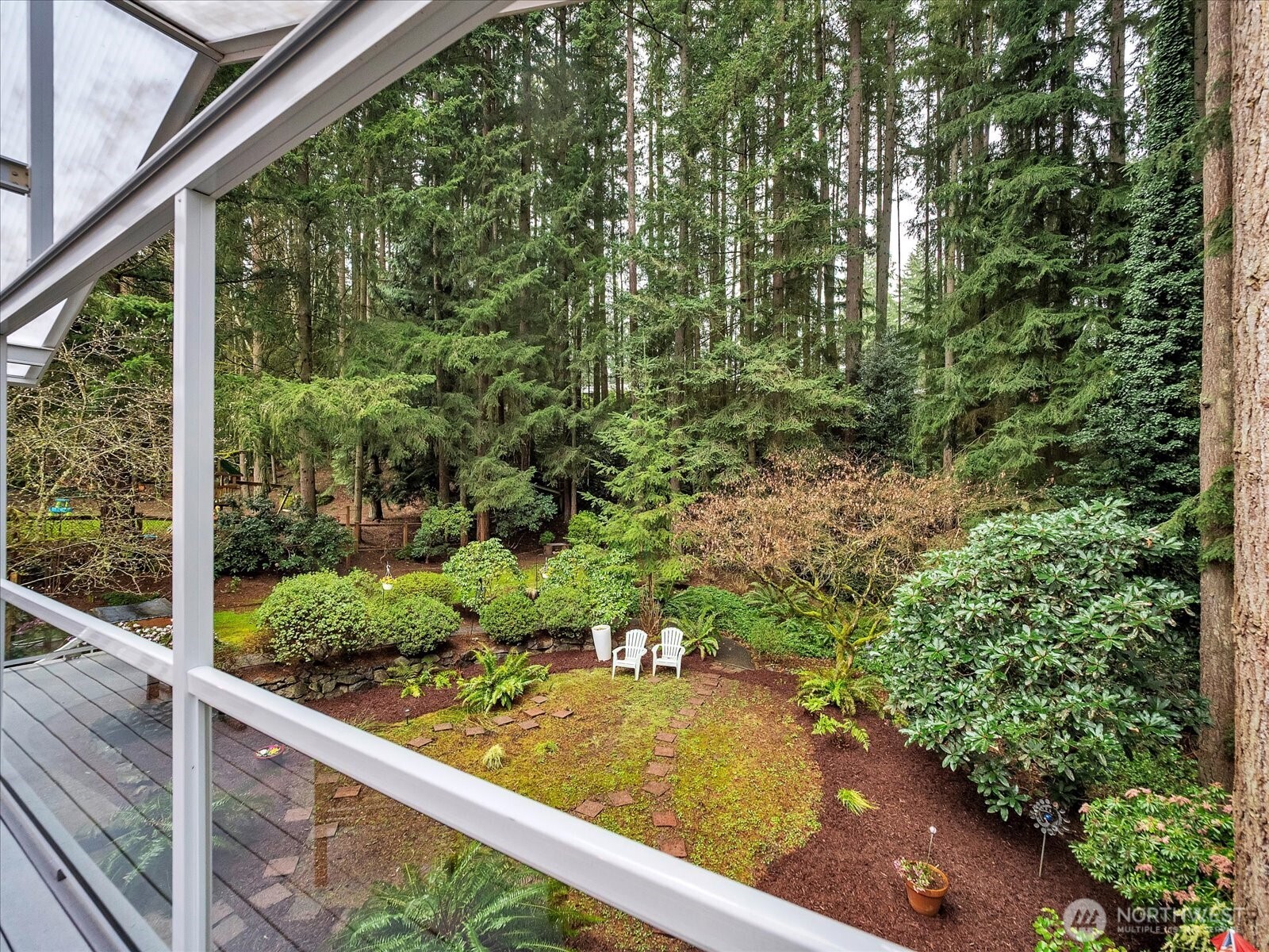 20921 28th Avenue Southeast Bothell, WA 98021 - Photo 31 of 37 a view of a garden from a balcony