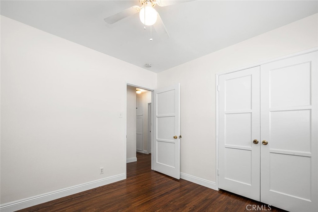 2154 North Studebaker Road Long Beach, CA 90815 - Photo 18 of 37 a view of an empty room with wooden floor