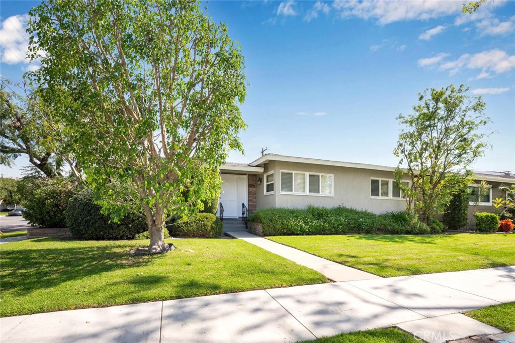 2154 North Studebaker Road Long Beach, CA 90815 - Photo 2 of 37 a view of a house with a yard