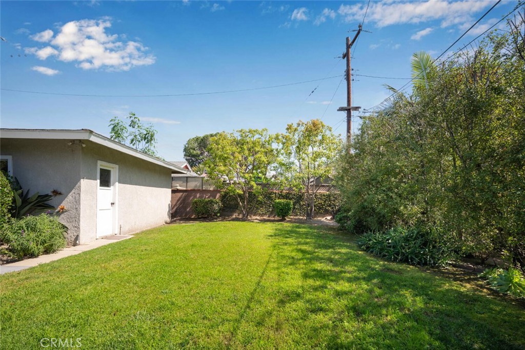 2154 North Studebaker Road Long Beach, CA 90815 - Photo 33 of 37 a view of a house with a yard