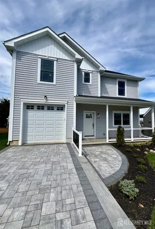 a front view of a house with yard