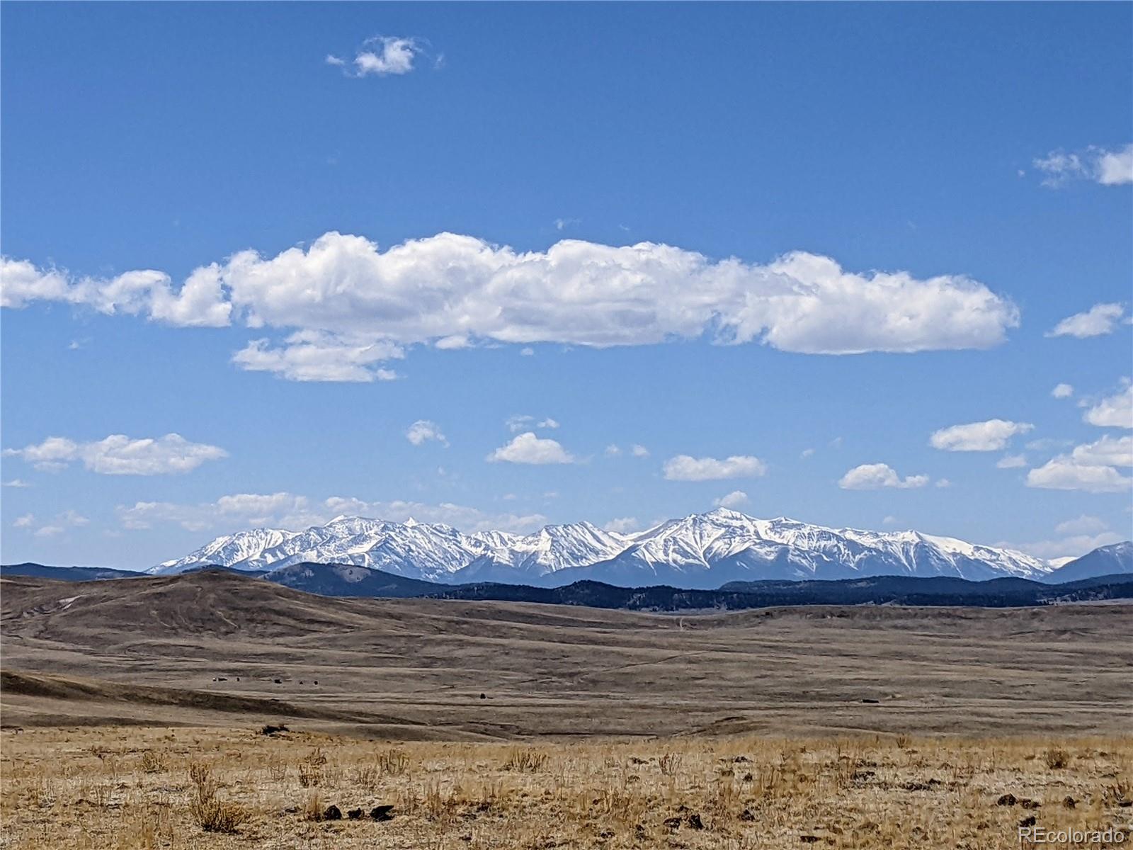 0 Uwon Road Hartsel, CO 80449 - Photo 4 of 16 a view of a town with mountains in the background