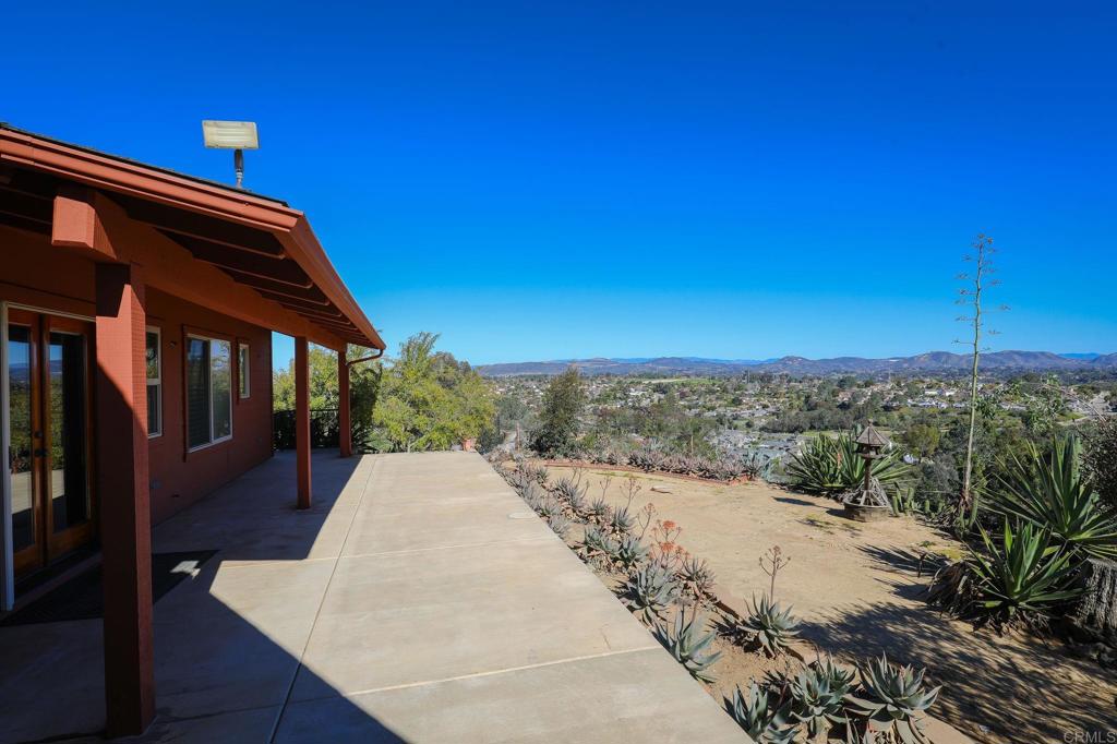 1575 Crest Drive Encinitas, CA 92024 - Photo 14 of 52 a view of a patio with wooden fence