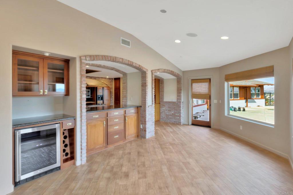 1575 Crest Drive Encinitas, CA 92024 - Photo 27 of 52 a view of an empty room with a window and fire place