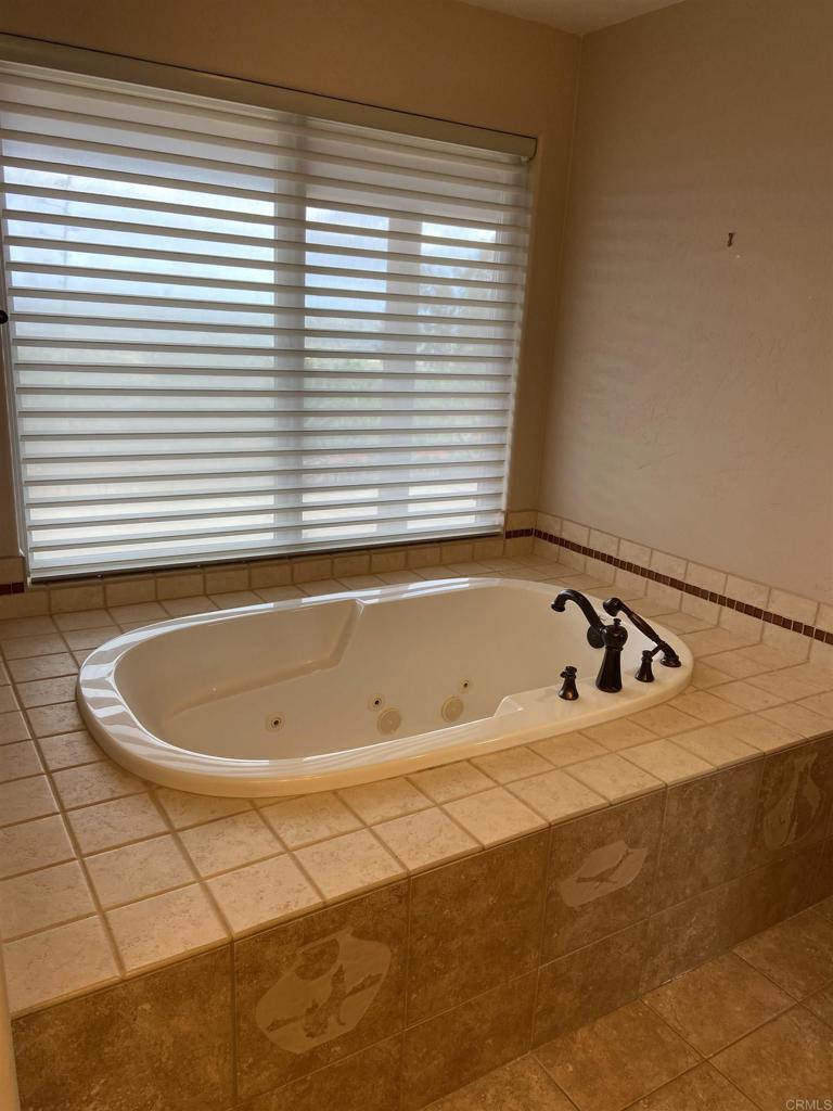 1575 Crest Drive Encinitas, CA 92024 - Photo 33 of 52 a view of a bathtub in a room