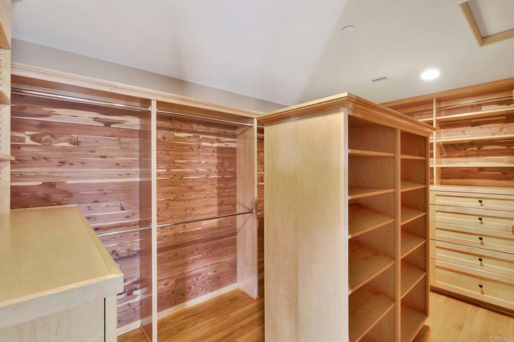 1575 Crest Drive Encinitas, CA 92024 - Photo 36 of 52 a view of walk in closet with empty racks
