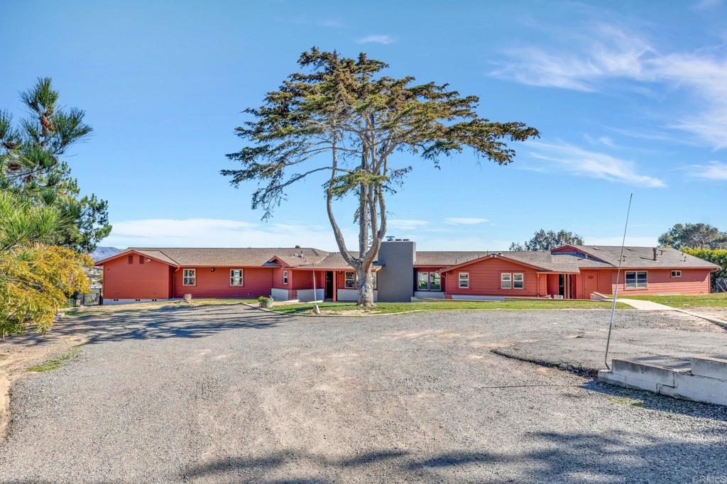 1575 Crest Drive Encinitas, CA 92024 - Photo 4 of 52 a view of a field with cars parked