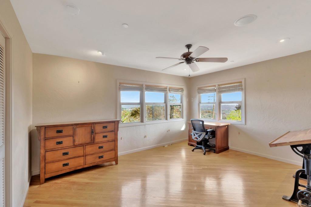 1575 Crest Drive Encinitas, CA 92024 - Photo 44 of 52 a living room with furniture and a window