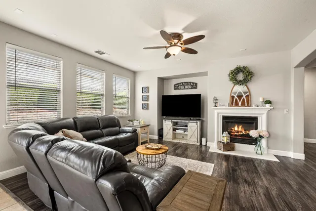 a kitchen with stainless steel appliances granite countertop a stove and a refrigerator