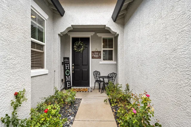 a front view of a house with an outdoor space