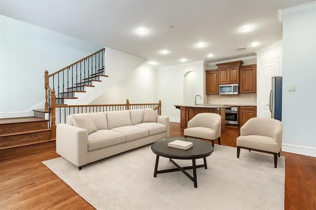 a living room with furniture and a couch