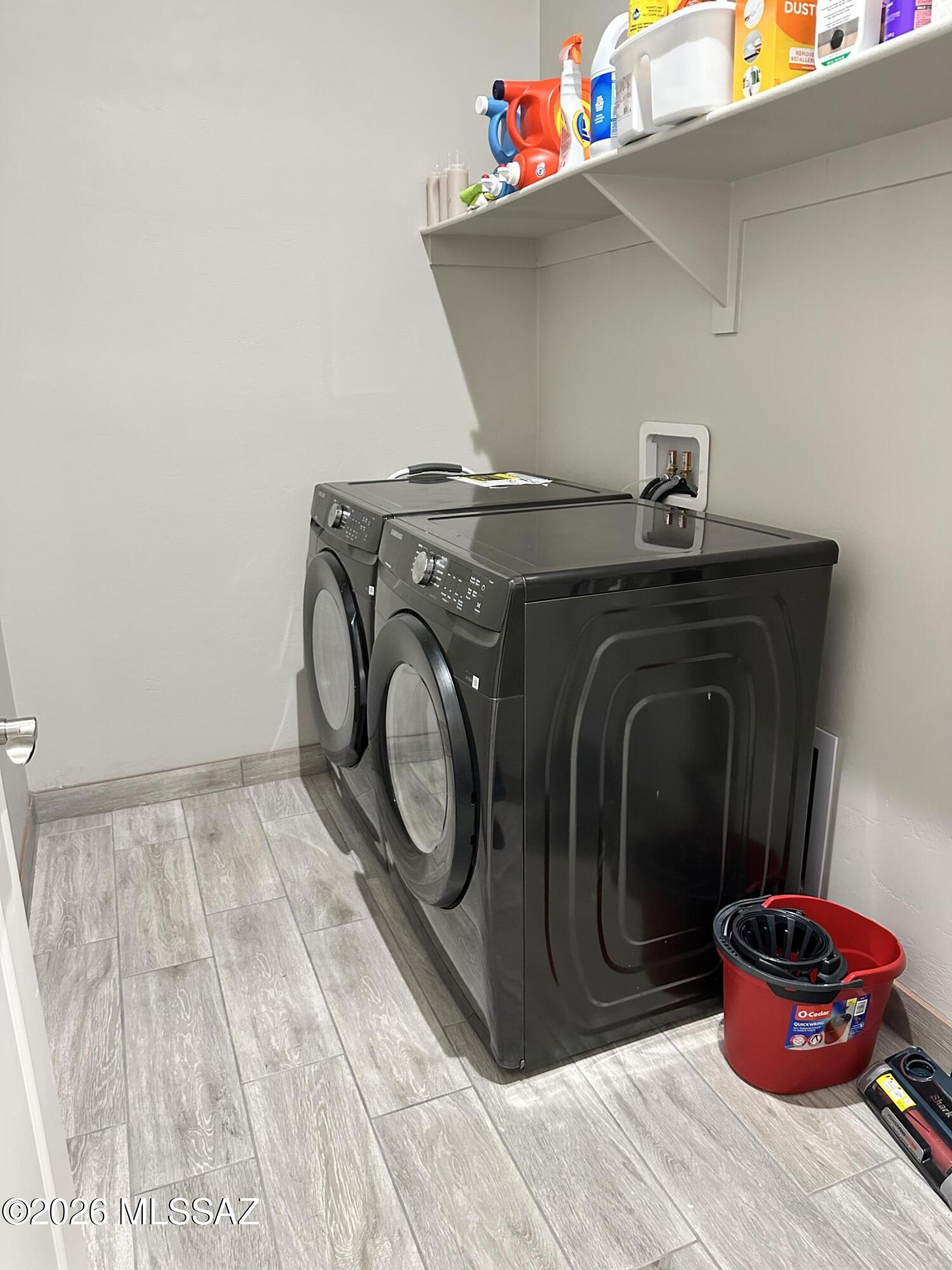 117 Ver Patria Rio Rico, AZ 85648 - Photo 14 of 28 a utility room with dryer and washer