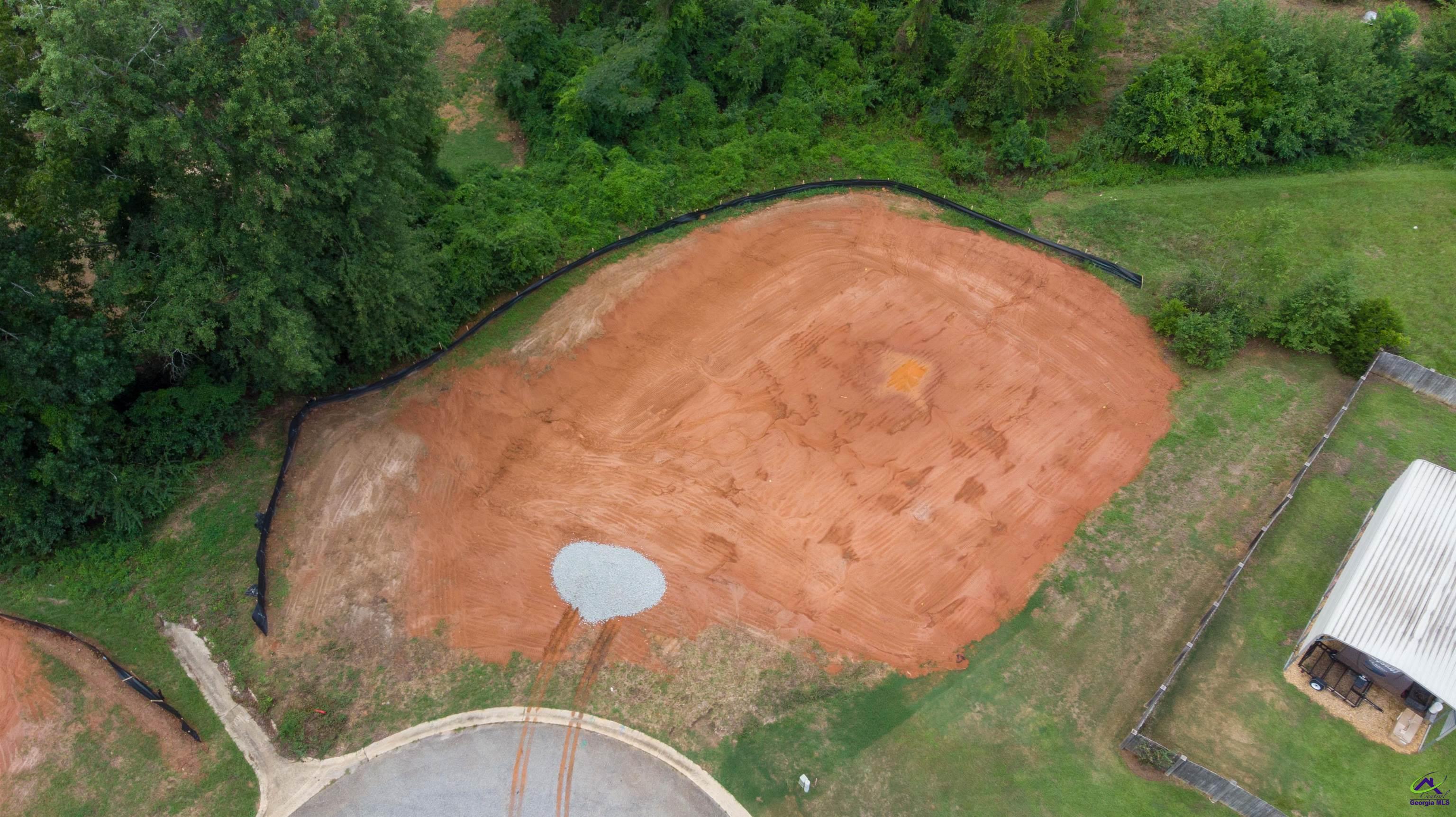 117 Constance Court Perry, GA 31069 - Photo 1 of 8 a view of a swimming pool with a yard