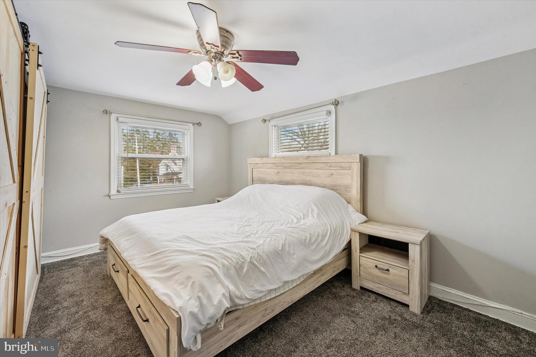 24 Upland Road Havertown, PA 19083 - Photo 16 of 28 a bedroom with a bed and a window