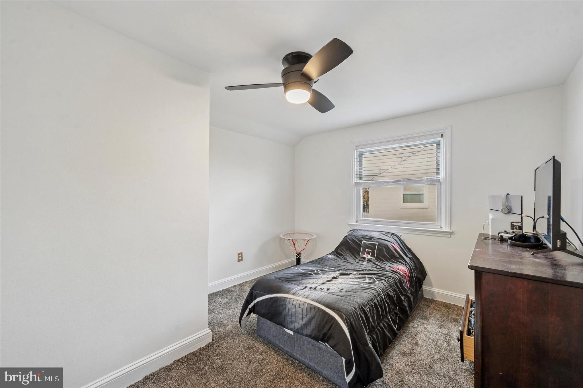 24 Upland Road Havertown, PA 19083 - Photo 21 of 28 a bedroom with a bed and a dresser