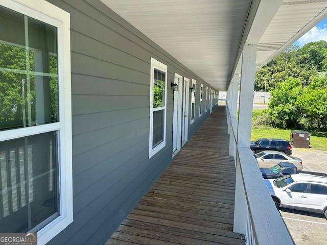 432 4th Avenue Dalton, GA 30721 - Photo 14 of 25 a view of a balcony with wooden floor