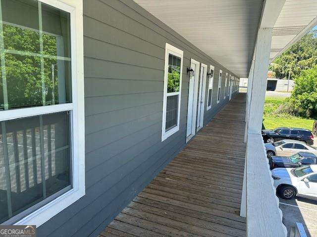 432 4th Avenue Dalton, GA 30721 - Photo 19 of 25 a view of balcony with wooden floor