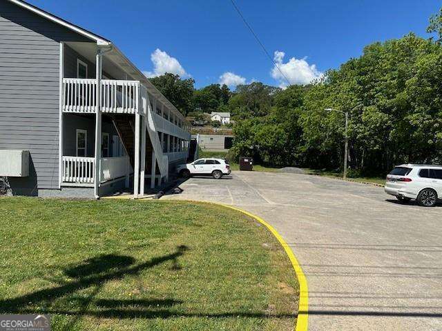 432 4th Avenue Dalton, GA 30721 - Photo 23 of 25 a view of a house with backyard