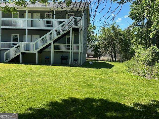 432 4th Avenue Dalton, GA 30721 - Photo 24 of 25 a view of a house with a swimming pool
