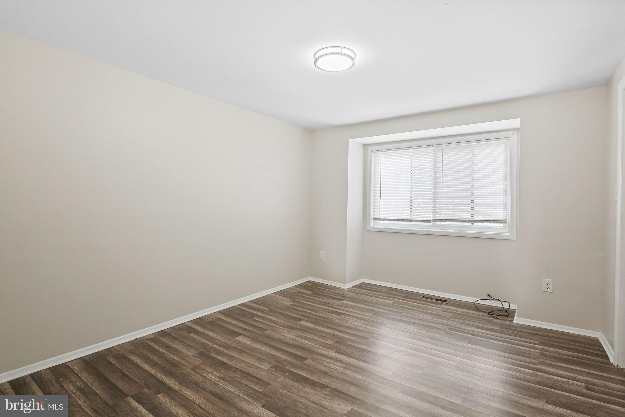 9411 Merryrest Road, Unit B Columbia, MD 21045 - Photo 12 of 25 All bdrms have neutral paint, new floors +lighting