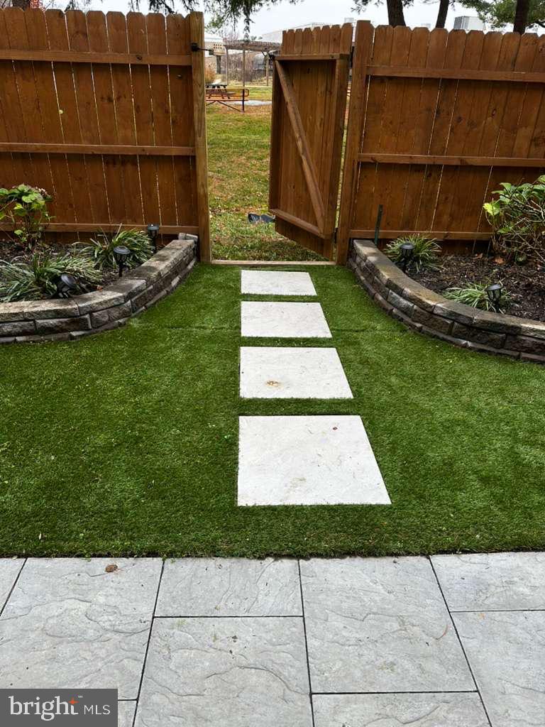 9411 Merryrest Road, Unit B Columbia, MD 21045 - Photo 19 of 25 Easy-care backyard space w/ low-maintenance turf