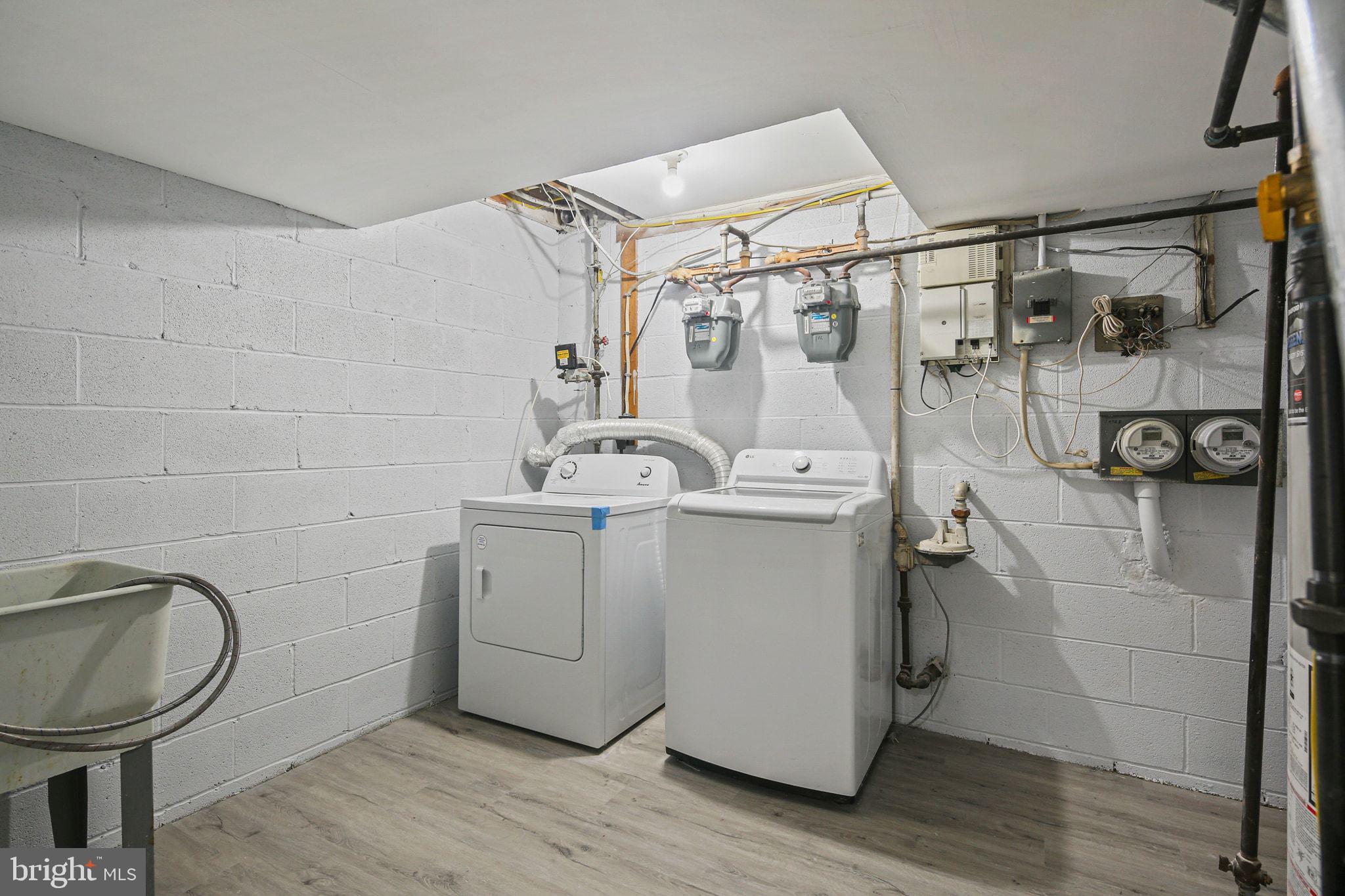 9411 Merryrest Road, Unit B Columbia, MD 21045 - Photo 25 of 25 Spacious laundry area w/ full size washer & dryer