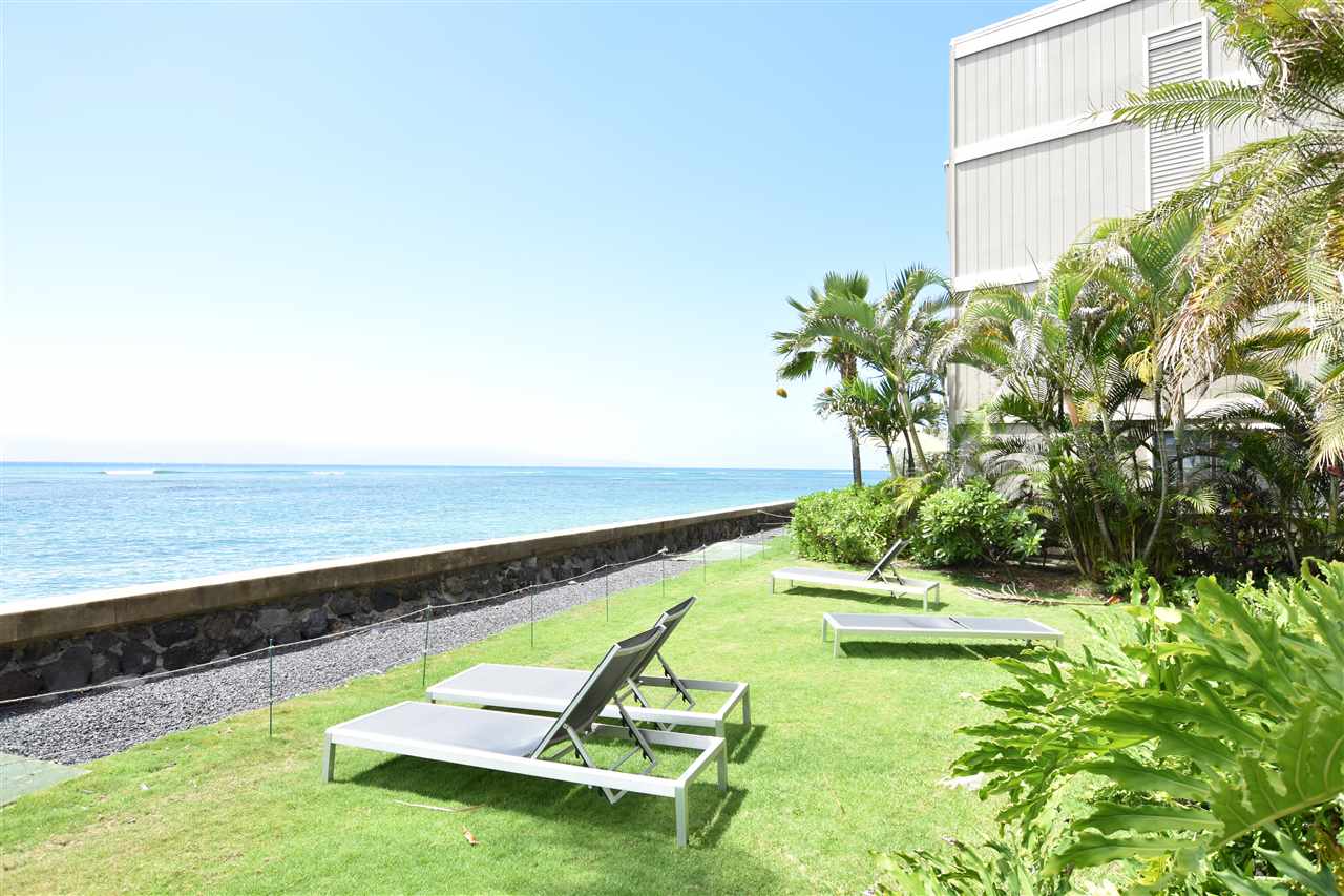 4435 Lower Honoapiilani Road, Unit 204 Lahaina, HI 96761 - Photo 17 of 23 a view of a swimming pool with a yard