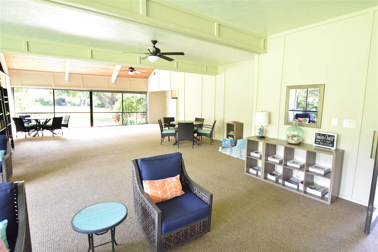 4435 Lower Honoapiilani Road, Unit 204 Lahaina, HI 96761 - Photo 22 of 23 a living room with furniture and a large window