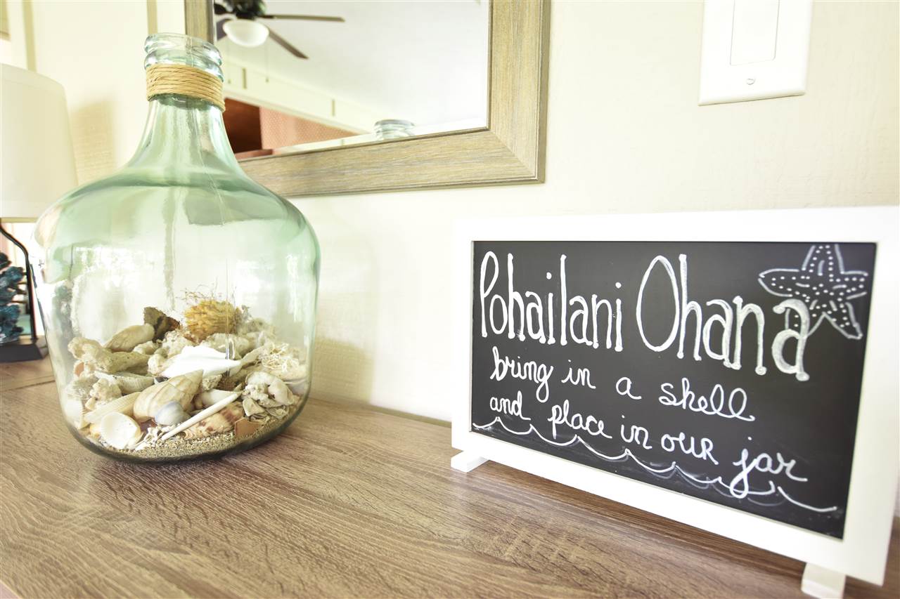 4435 Lower Honoapiilani Road, Unit 204 Lahaina, HI 96761 - Photo 23 of 23 a view of a hallway with wooden floor and windows