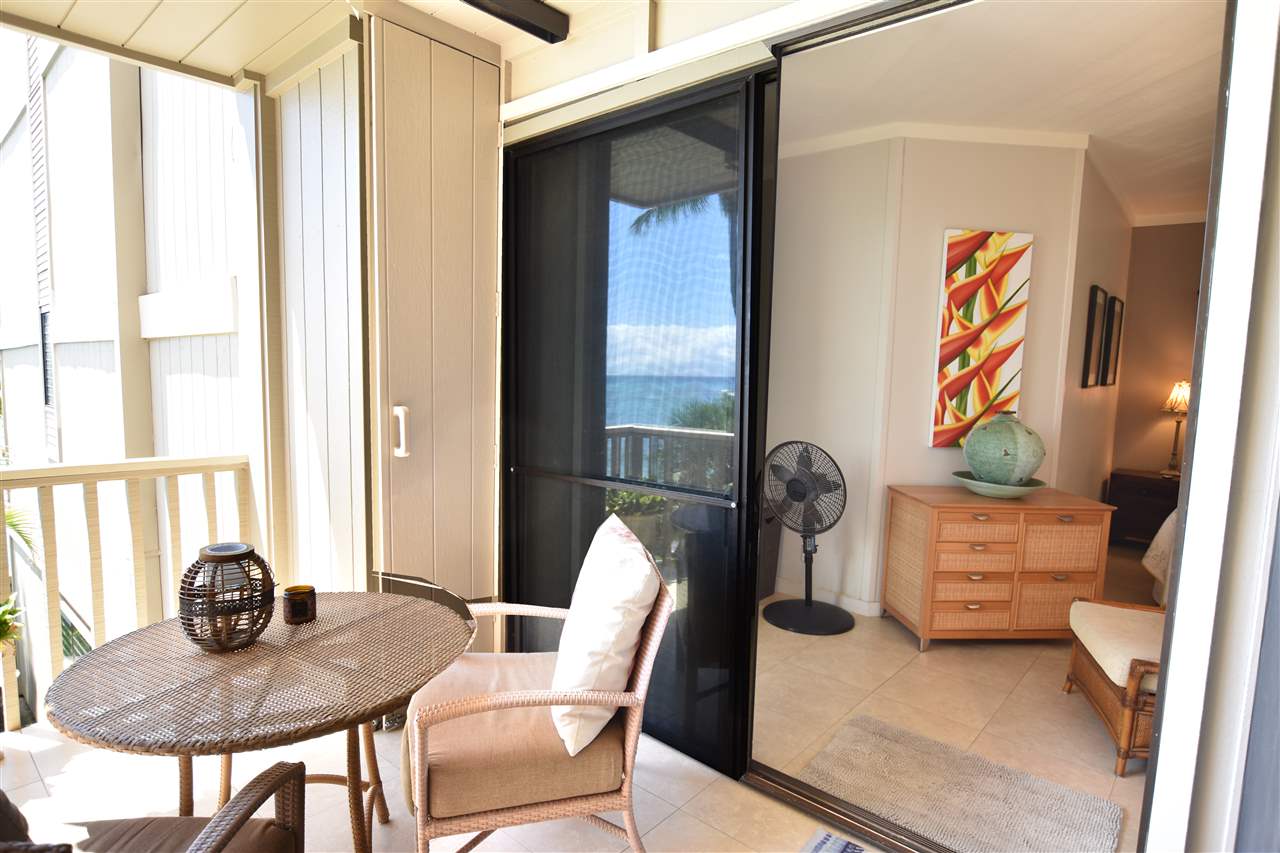 4435 Lower Honoapiilani Road, Unit 204 Lahaina, HI 96761 - Photo 7 of 23 a dining room with furniture and window