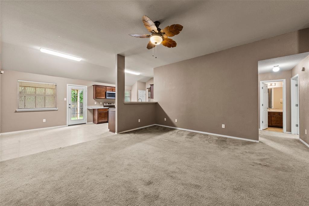10512 Granada Drive Waco, TX 76708 - Photo 3 of 22 a view of an empty room with a window