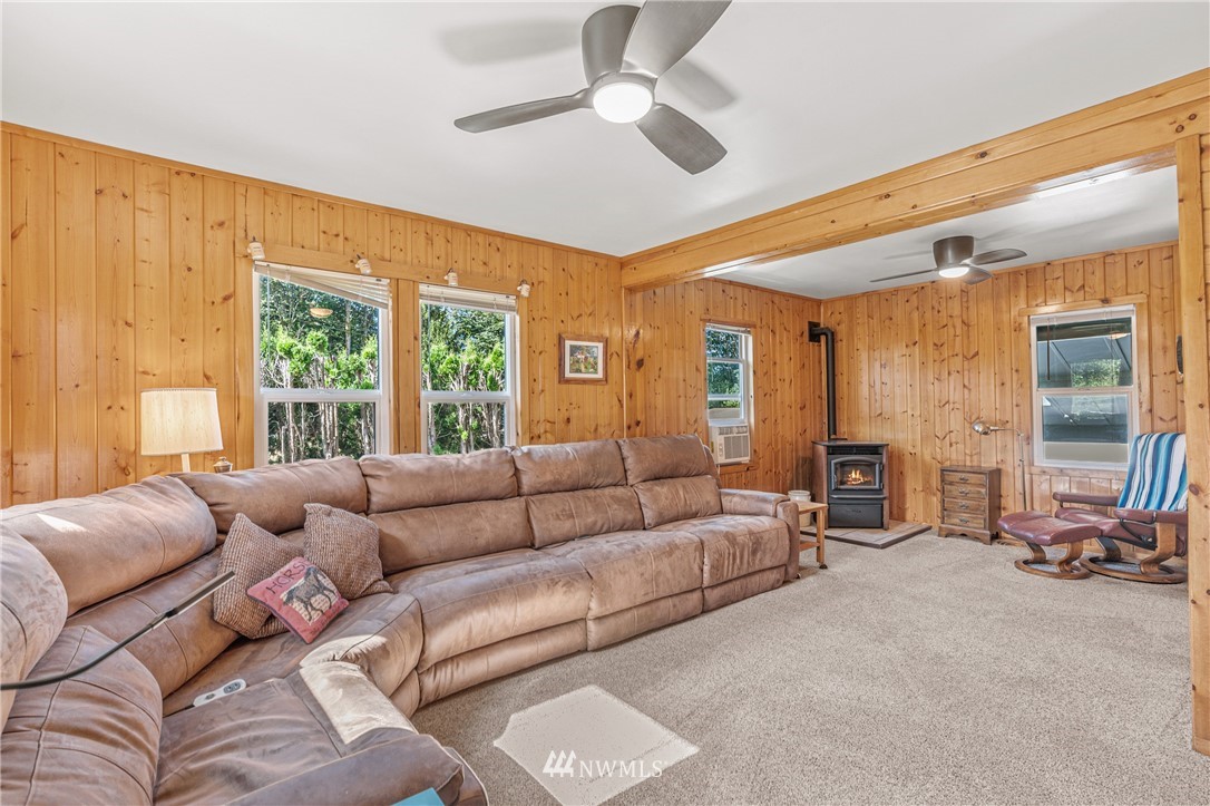 7023 Skipley Road Snohomish, WA 98290 - Photo 14 of 40 a living room with furniture and a large window