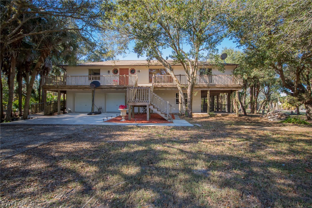 3760 Ellis Road Fort Myers, FL 33905 - Photo 25 of 25 a view of a house with a yard