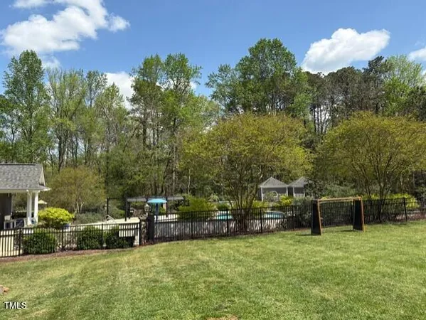 a view of a house with a big yard