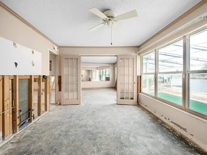 a view of a room with white walls