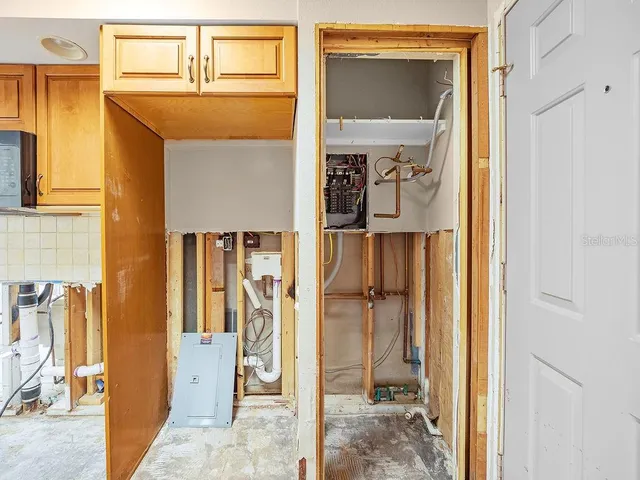 a view of an empty room with a window