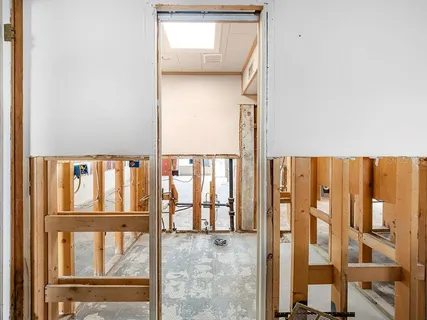 view of living room with furniture and floor to ceiling window