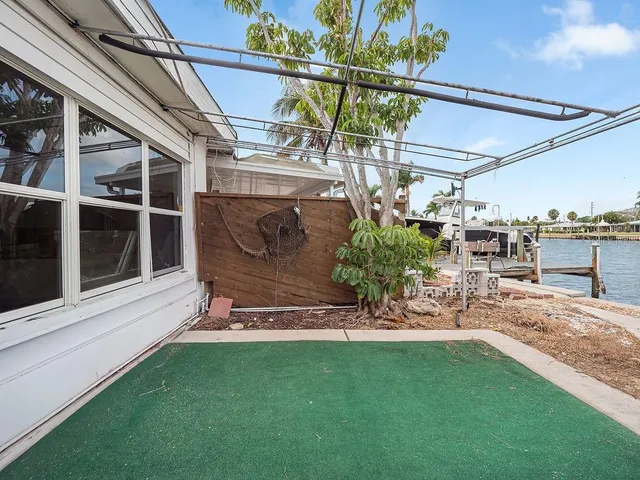 a view of a back yard of the house