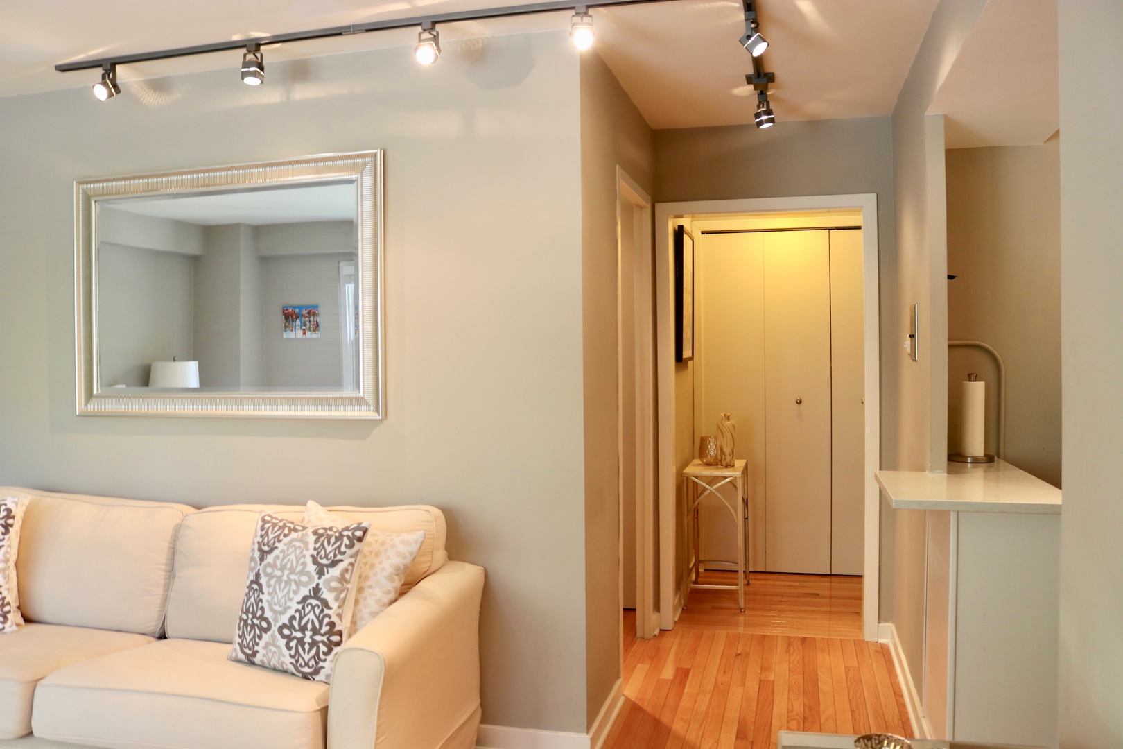 2909 North Sheridan Road, Unit 201 Chicago, IL 60657 - Photo 8 of 18 a living room with a bed and furniture