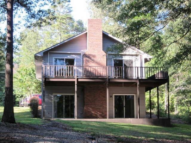 1578 Hatton Ford Road Hartwell, GA 30643 - Photo 1 of 1 a view of a house with a yard and large tree