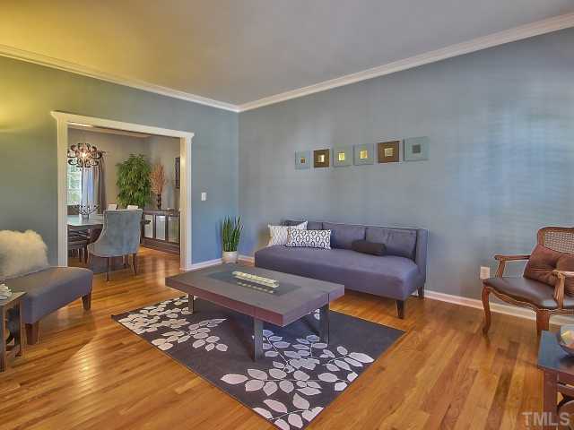 8008 Mill Bluff Court Raleigh, NC 27616 - Photo 5 of 25 a living room with furniture and wooden floor