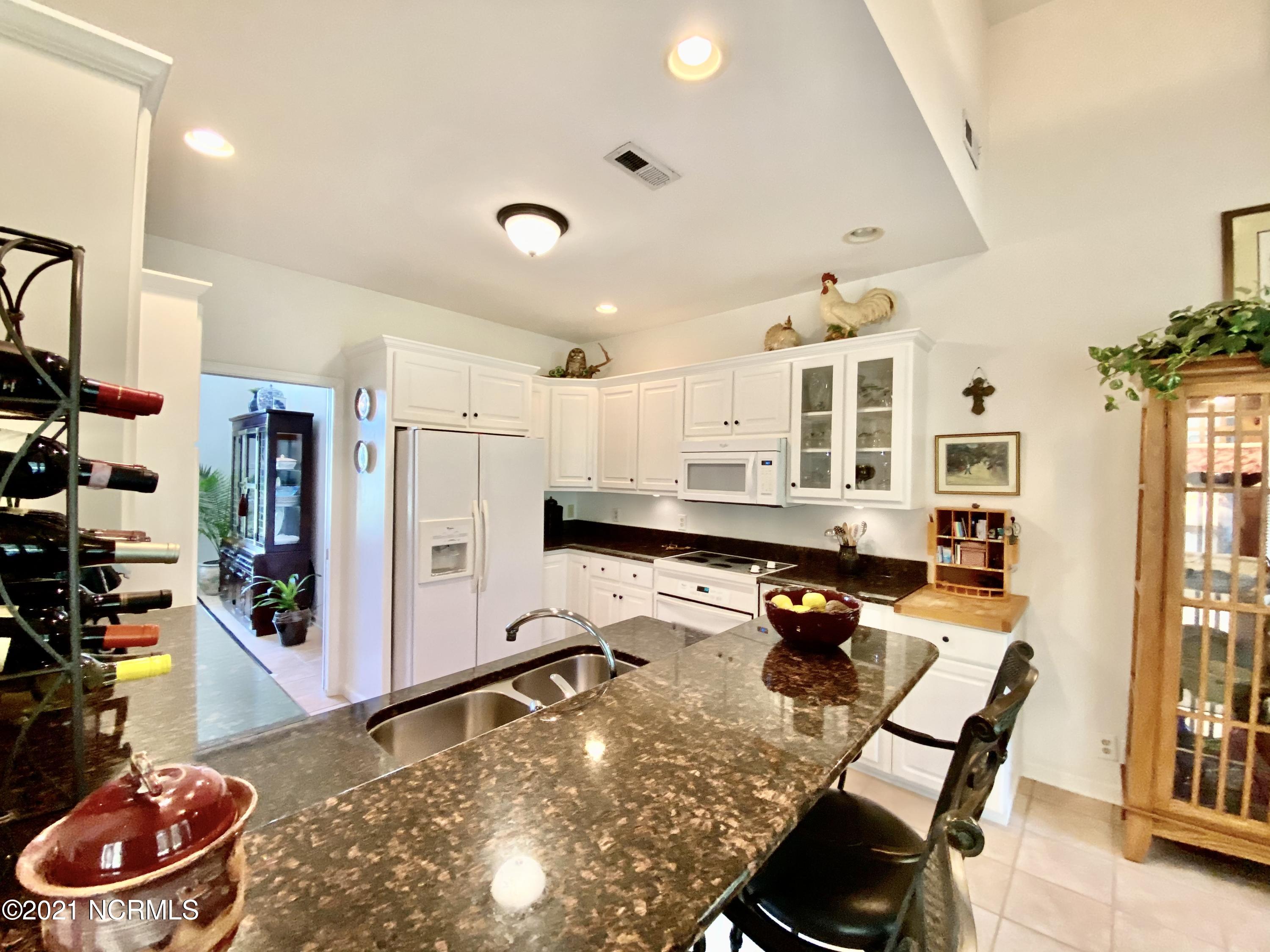 152 Rice Mill Circle Sunset Beach, NC 28468 - Photo 13 of 58 EA34FBF5-9840-4FC5-92DF-22188352990D