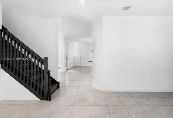 a view of entryway with stairs
