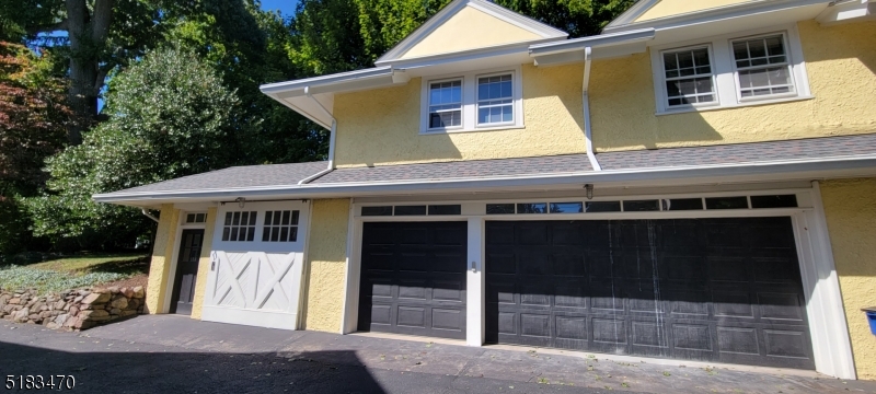 a view of a house with a door and wooden floor