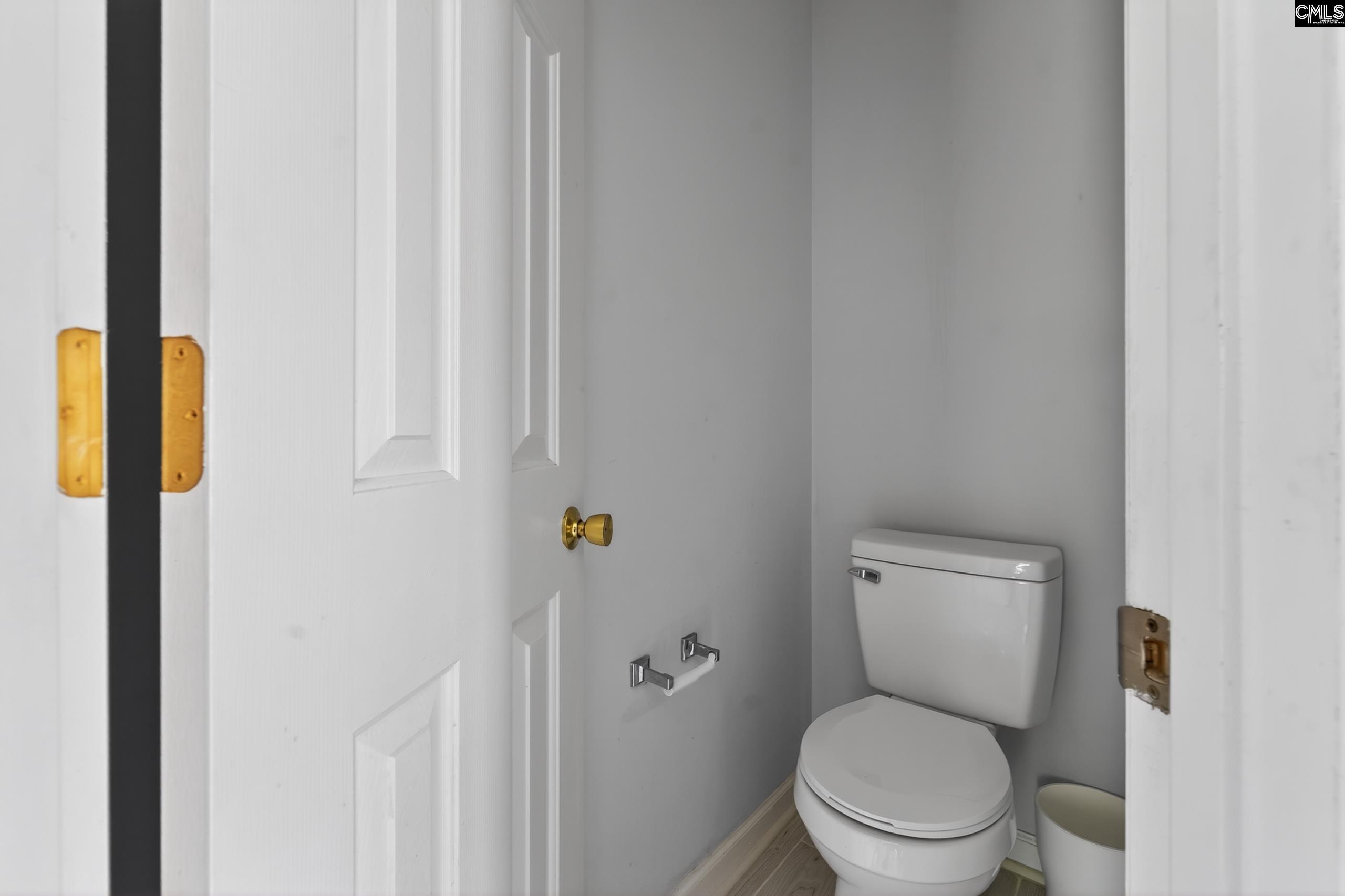 219 Plantation Pointe Drive Elgin, SC 29045 - Photo 16 of 56 a white toilet sitting next to a shower