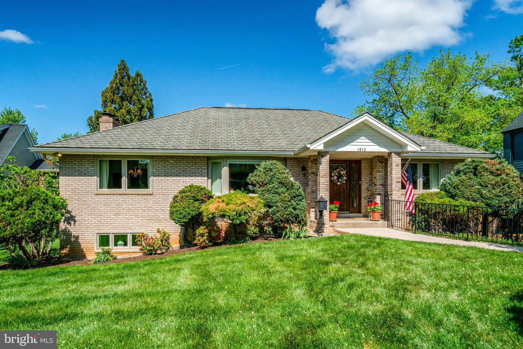 1812 A Birch Road McLean, VA 22101 - Photo 2 of 59 Charming brick home with lush greenery.